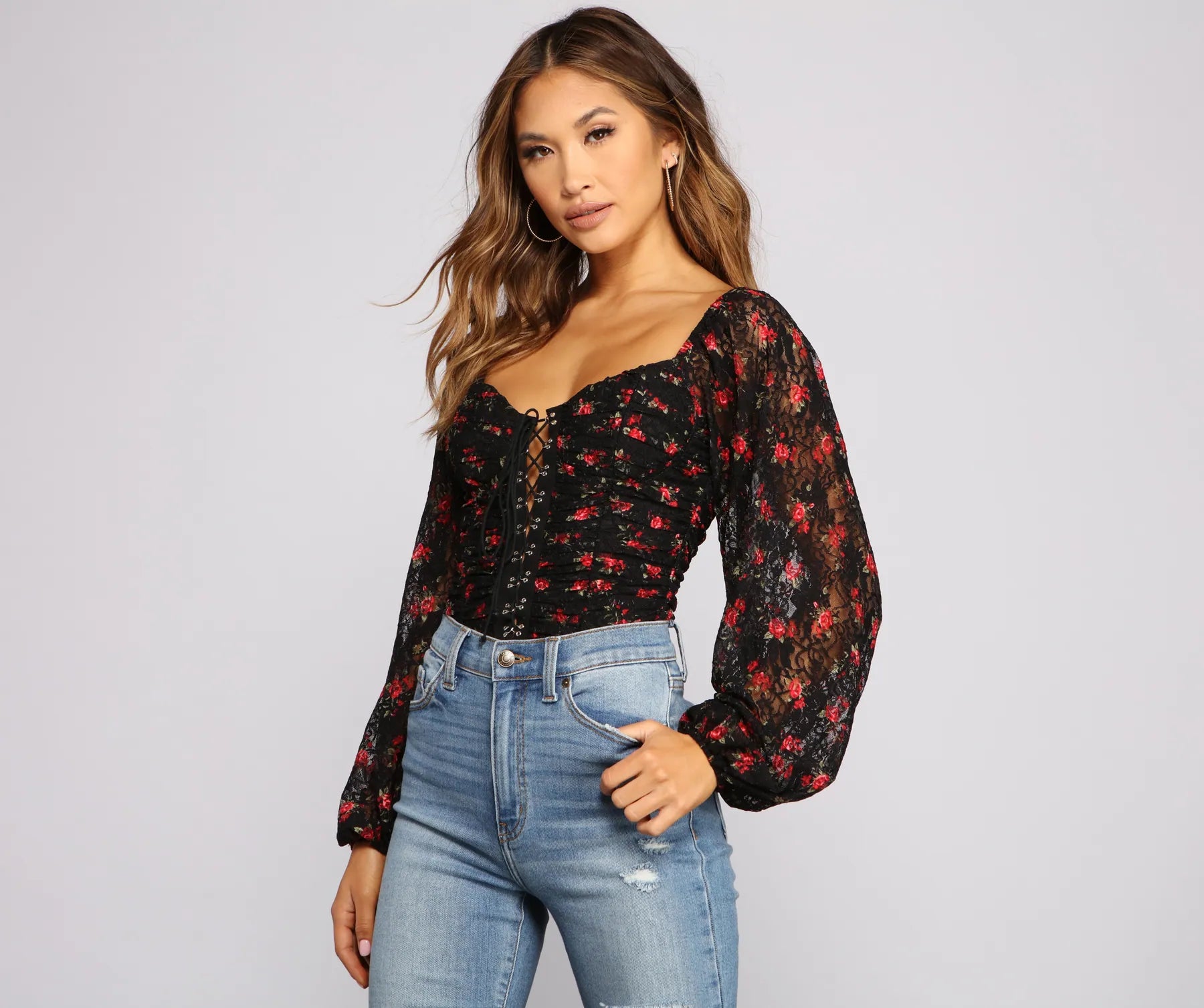 Printed Graphic Women Long Sleeve Top with a Bold StatementFloral Passion Lace-Up Bodysuit