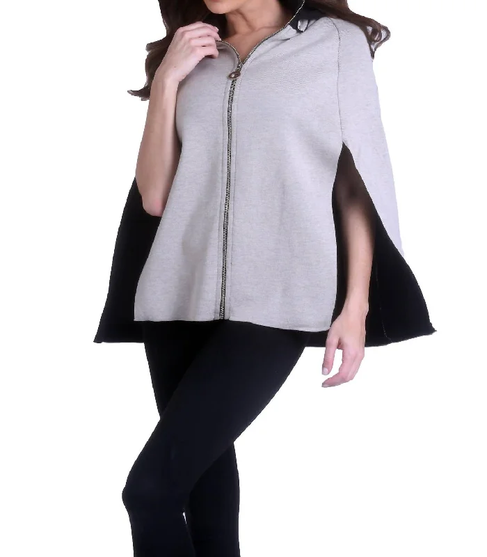 Color - Blocked Women Sweater for a Bold Fashion StatementColor - Blocked Women Sweater for a Bold Fashion StatementHigh Slit Detachable Hooded Poncho In Black/stone