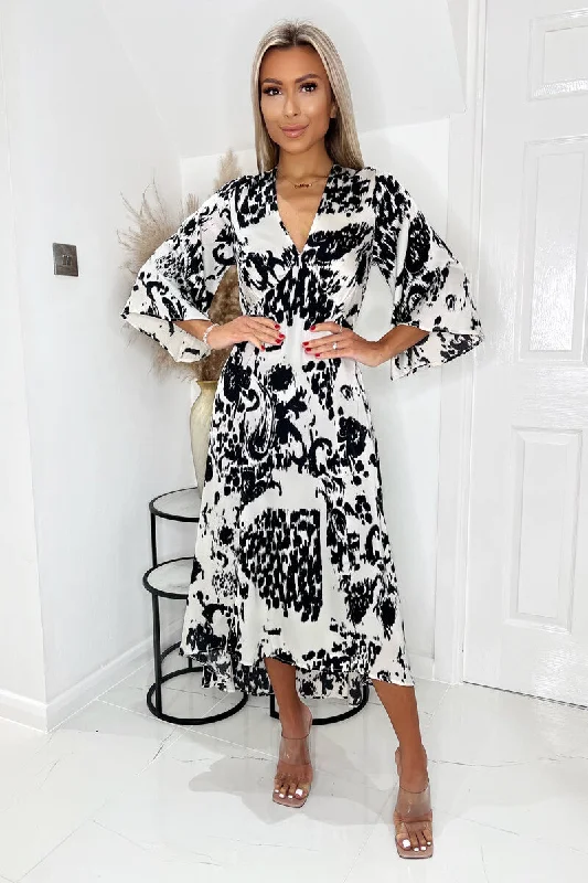 Halter Neck Women Dress to Show Off the Shoulders and NecklineBlack And Cream Printed V Neck Bell Sleeve Midi Dress