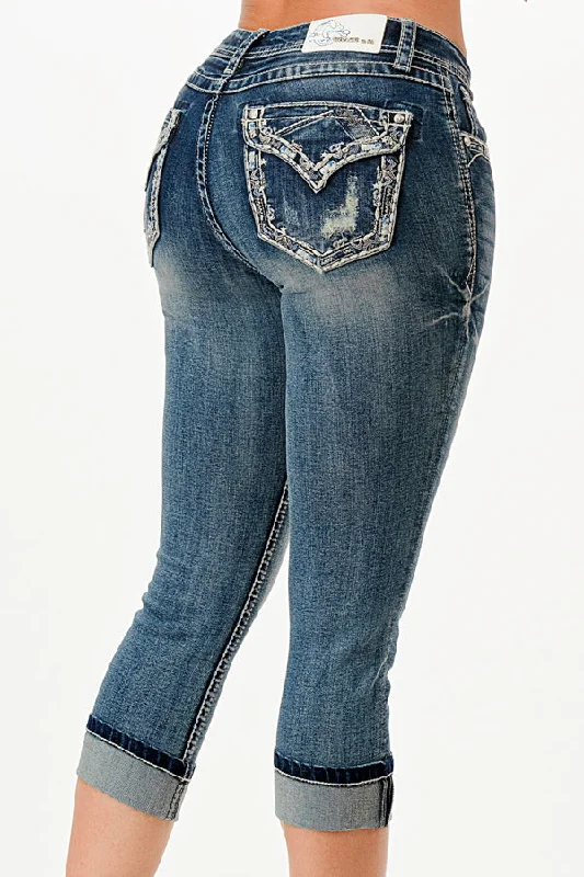 Distressed women jeans for a trendy and edgy lookBorder Faux Flap Embellished Mid Rise Capri Jeans