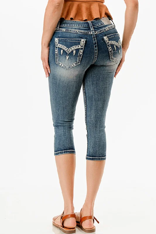 Ripped women jeans for a rebellious and fashion - forward styleBorder Faux Flap Embellishment Mid Rise Capri Jeans