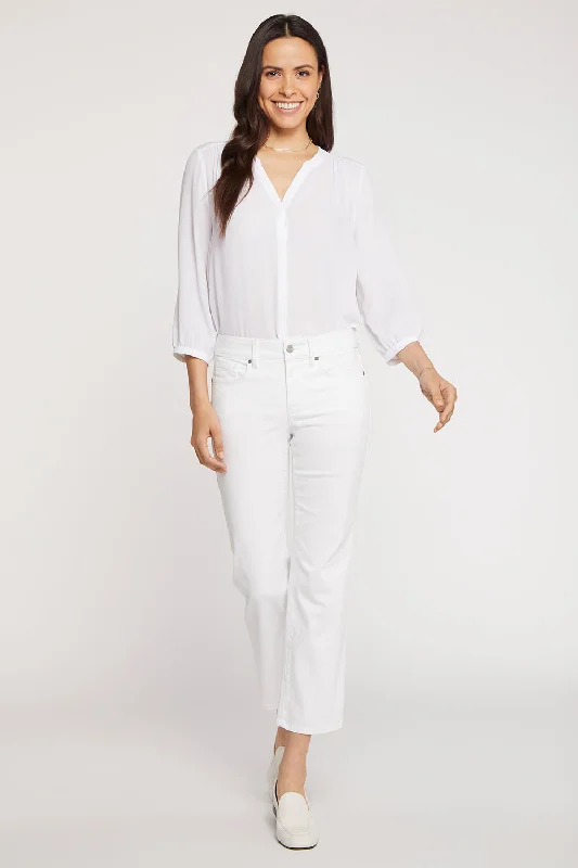 Embellished women jeans with studs or rhinestones for a glamorous touchMarilyn Straight Ankle Jeans In Petite - Optic White