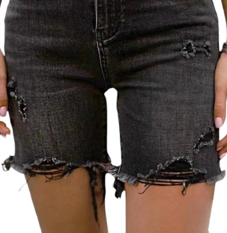 Ruffled Hem Women Shorts to Add a Feminine TouchHigh-Waisted Washed Distressed Shorts In Black